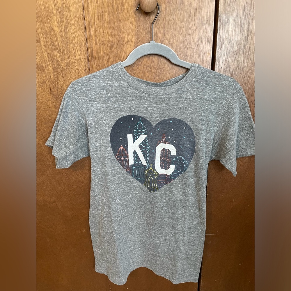 Charlie Hustle classic KC heart t-shirt with Plaza  background.